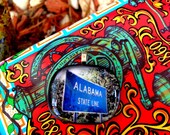 Alabama necklace. Glass homemade necklace with Alabama state line sign. Bama jewelry.