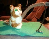 Tabby catching a fish. Needle Felt