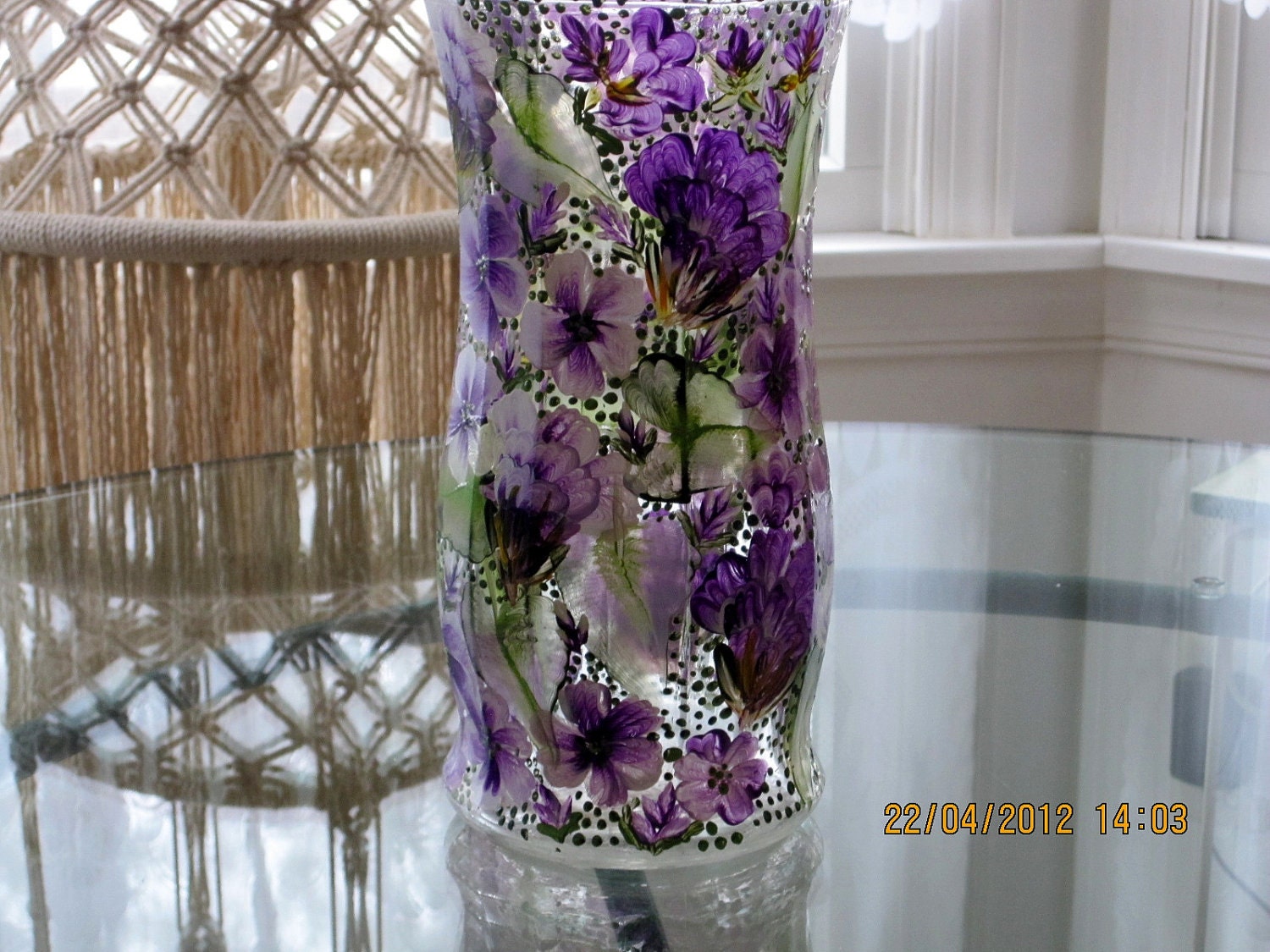 Vase with purple flowers