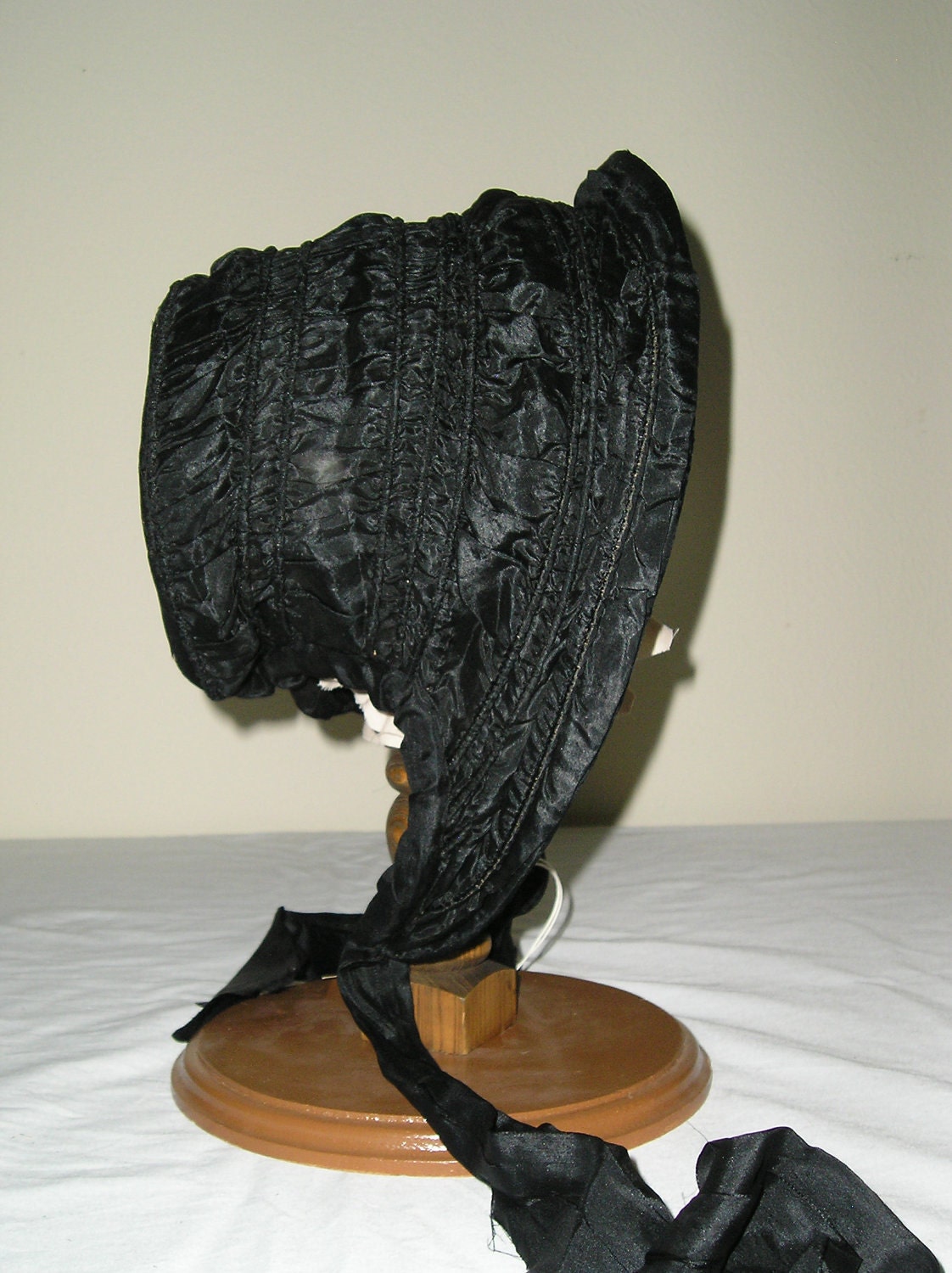 1850s Black silk taffeta gathered bonnet