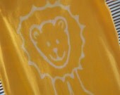 Baby onesie, hand dyed golden yellow with lion front and back