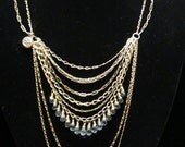 Sold can make variation Blue Topaz, Moonstone and Silver Lotus Necklace