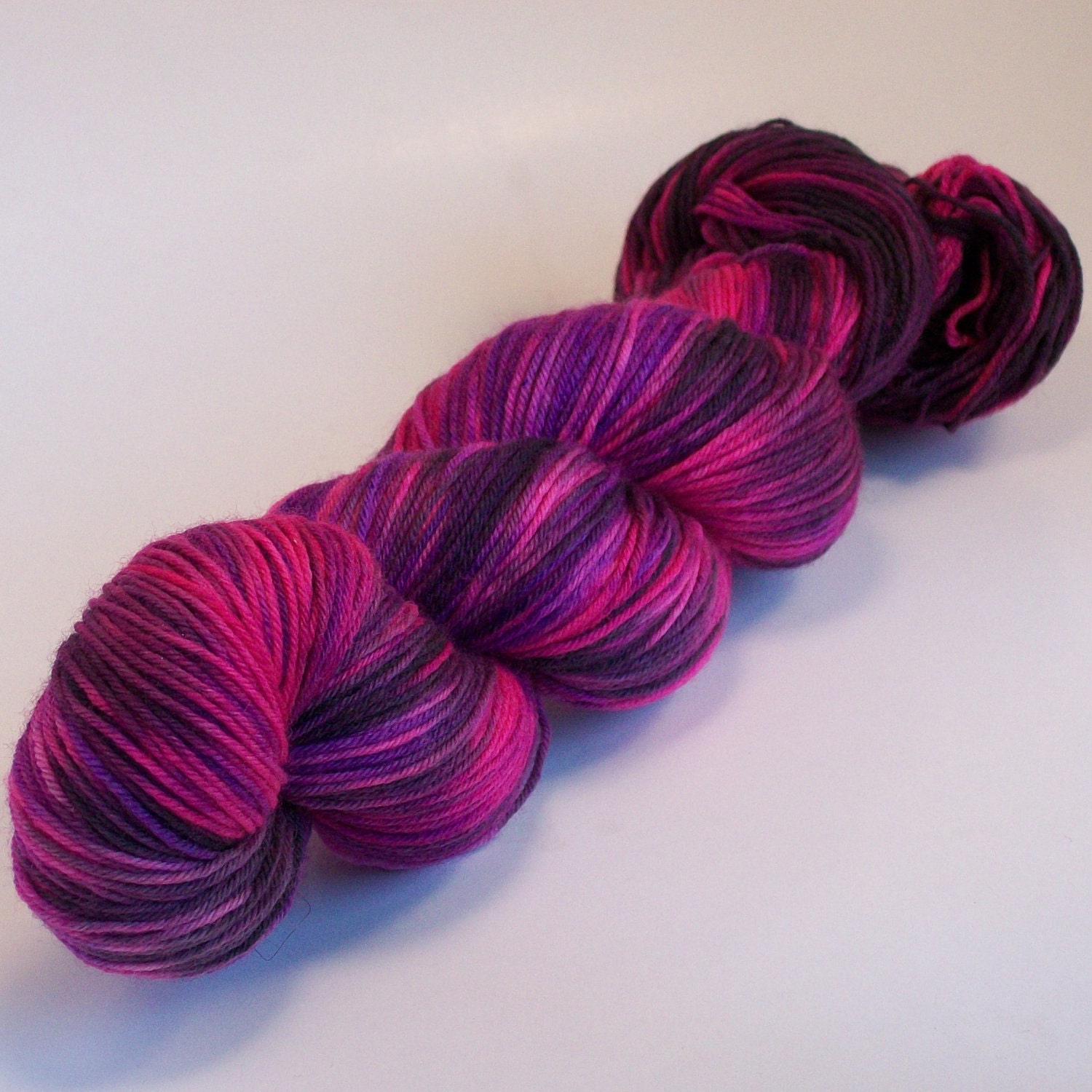 Like Pink on Lolo 75/25 SW Merino Nylon Hand dyed fingering weight sock yarn
