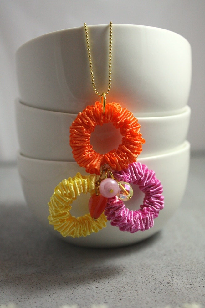 Neon necklace. 3 neon wreaths on a gold chain. Neon jewelry. Fashion trend. Handmade fashion jewelry.