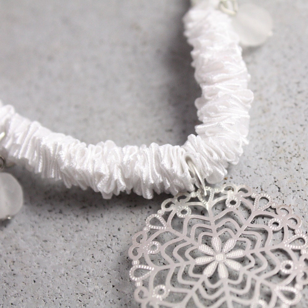 Handmade white lace and ribbon necklace. Bridal necklace. Silver laser cut lace pendant and ruffled satin ribbon necklace.