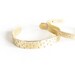 Brass Bangles Cuff Set / hand-formed brass bangle bracelets / hammered arrow design / the shiny tribal & matte gold pierced cuff gift set