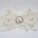 Pearls and rhinstone with cream rose on white lace garter