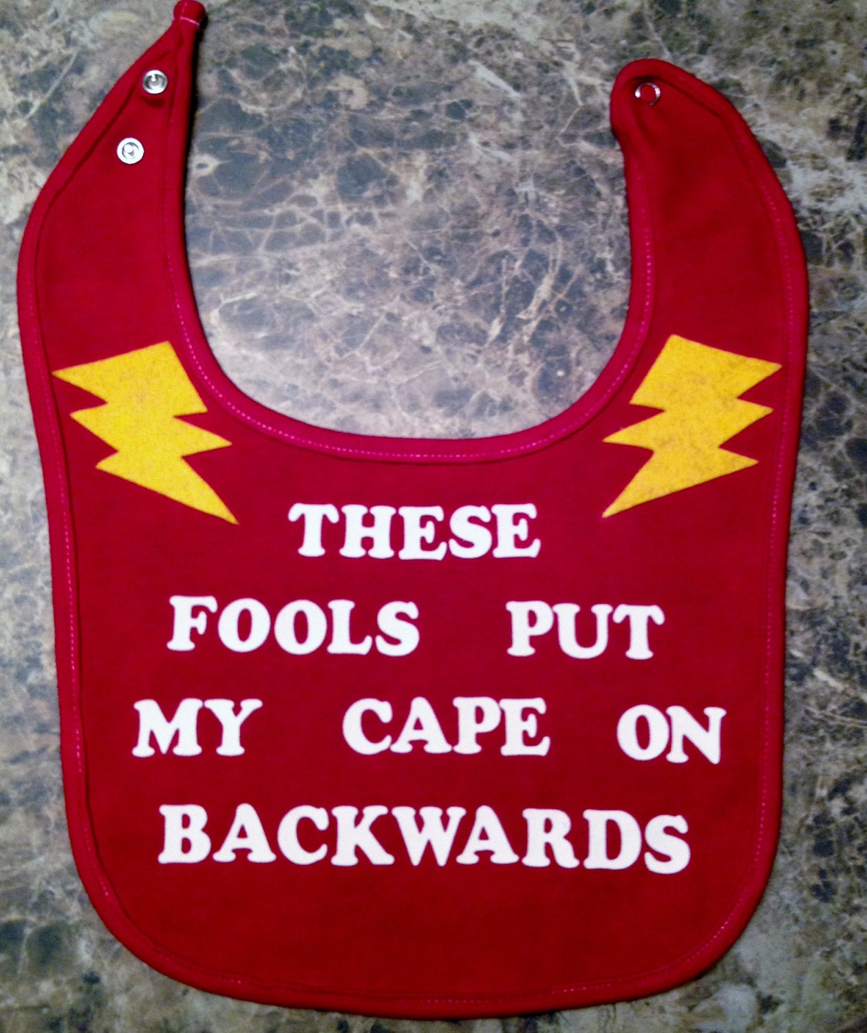 Unique Baby Bib With Cute Decal-"These Fools Put My Cape On Backwards"