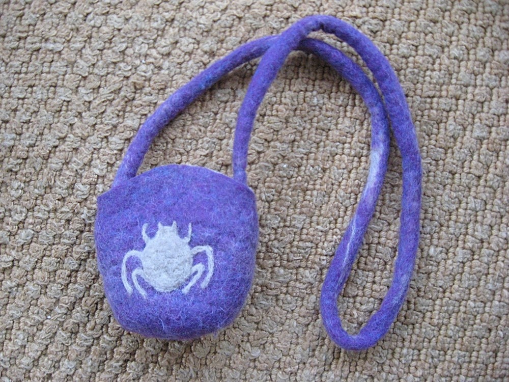 purple tick handbag