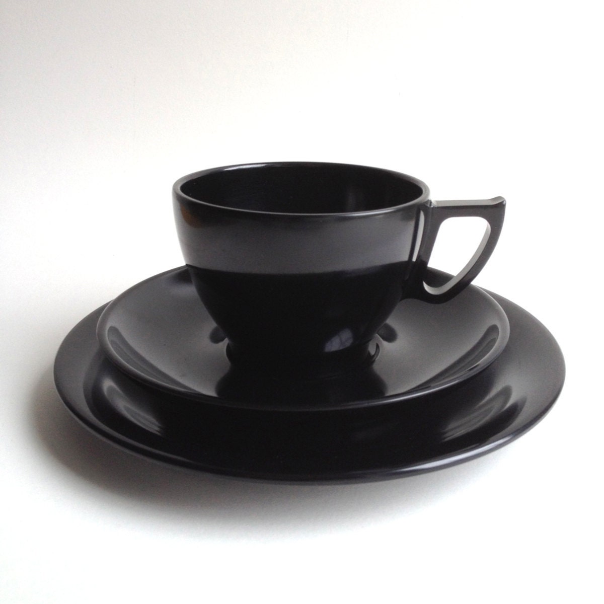 Very black: Melaware tea cup, saucer and side plate