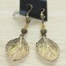 Dangling Earrings with a Gold Leaf