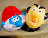 Papa Smurf and Gargamel rubber heads. Water toys
