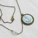 Necklace with a navy anchor on mint background - blue anchor, blue and green