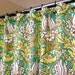 Amy Butler Shower Curtain in Water Lily Pattern in Shades of Green and White sized 72" x 72" (curtain hooks sold separately)