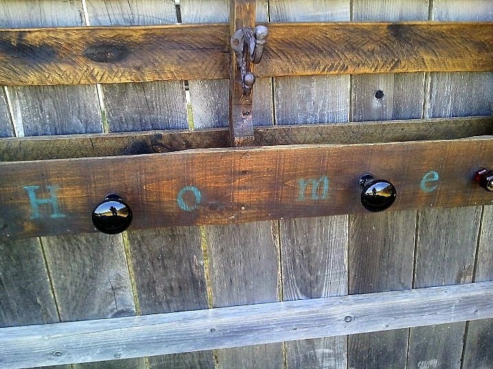 Pallet coat/purse/hat rack/shelf with storage, antique door and glass knobs