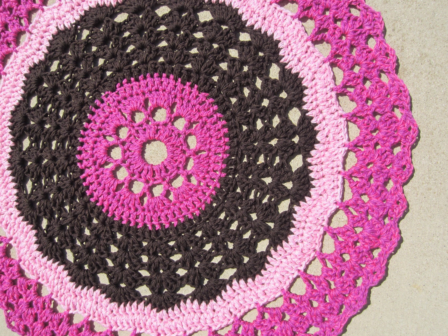 ROUND DOILY BLANKET in brown and pink. Crochet round blanket perfect for baby or girl's room. Fun and Sophisticated.