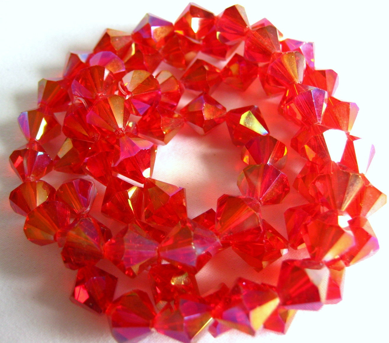 SALE - coral bicone glass ab beads 10mm 1/2 strand