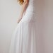 Beautiful low back French lace & silk chiffon wedding dress with capped sleeves