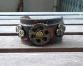 Leather Cuff Bracelet, with steampunk gears, antique Rivets and Buckle Closure