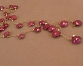 Faceted natural ruby briolette lariat with crystal, hand knotted on silk