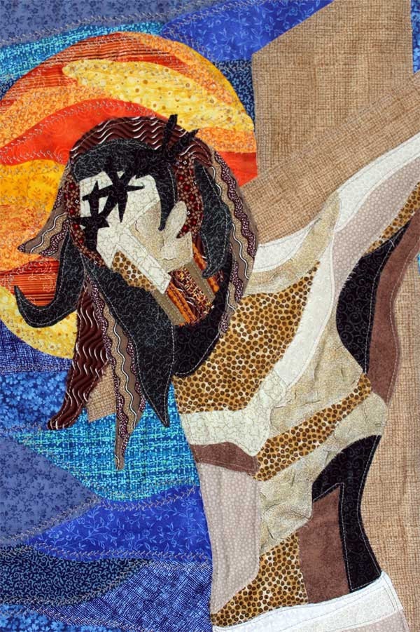 Quilted wall hanging of crucifixion