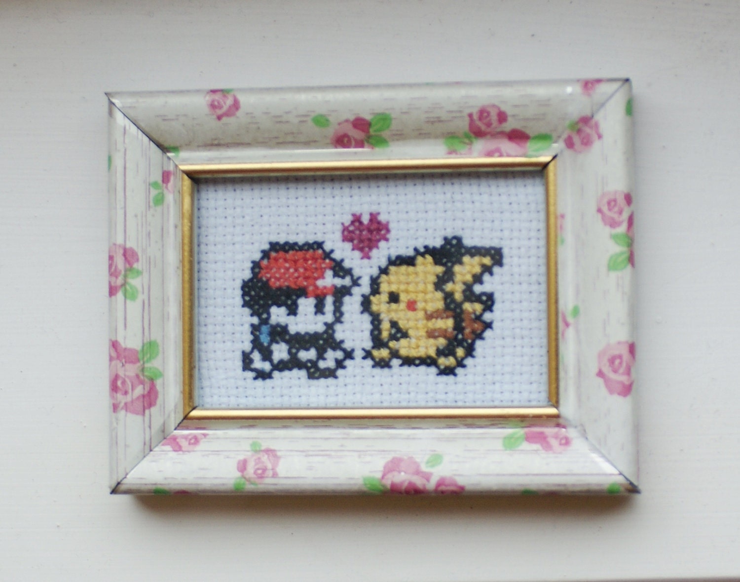 SALE - Trainer, Pikachu & love heart: Pokemon-inspired mini cross stitch in a vintage floral rose-patterned "shabby chic" frame