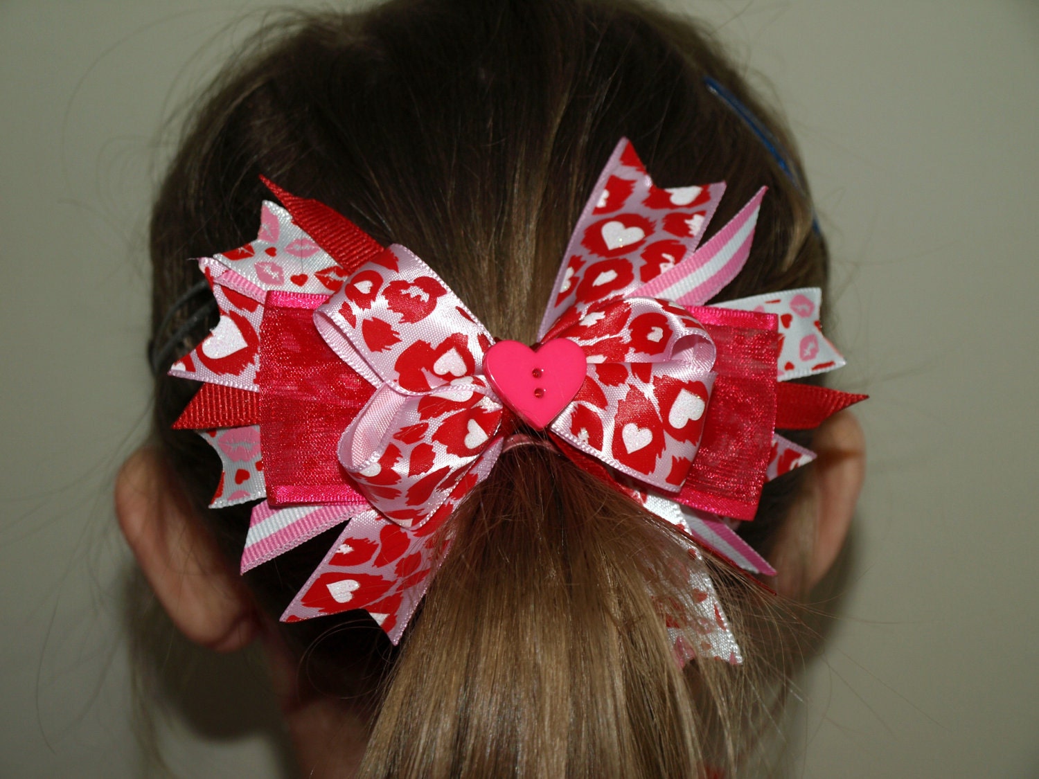 red and pink kiss me hair bow