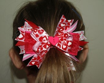 red and pink kiss me hair bow