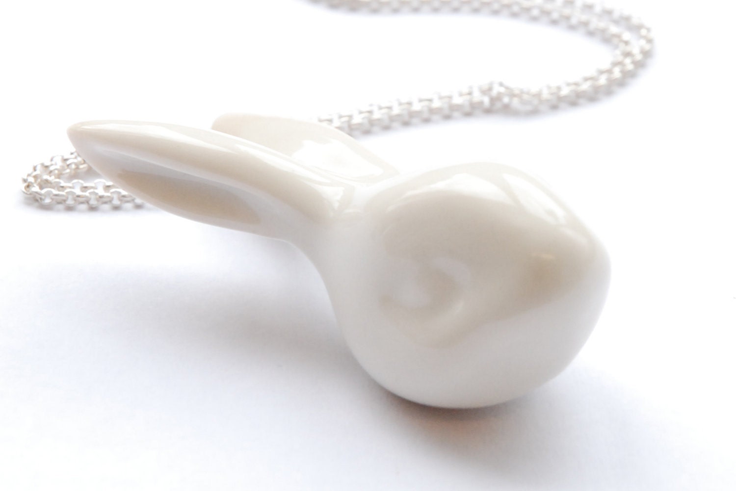 Bunny head necklace, porcelain and silver.