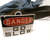 a bit naughty - vintage belt buckle