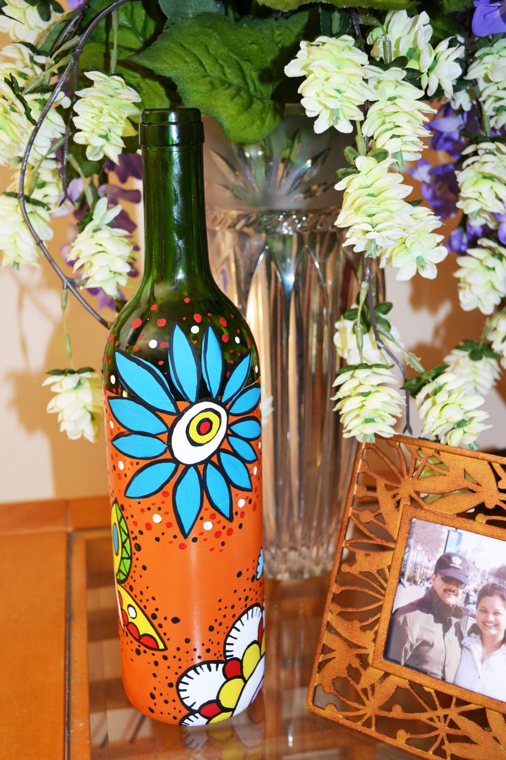recycled and brightly painted wine bottles