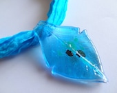 Turquoise blue, leaf motif glass beads, silk necklace