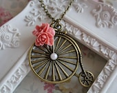 Vintage cycle necklace, antique bronze pearl pendant, pink flower charm jewellery