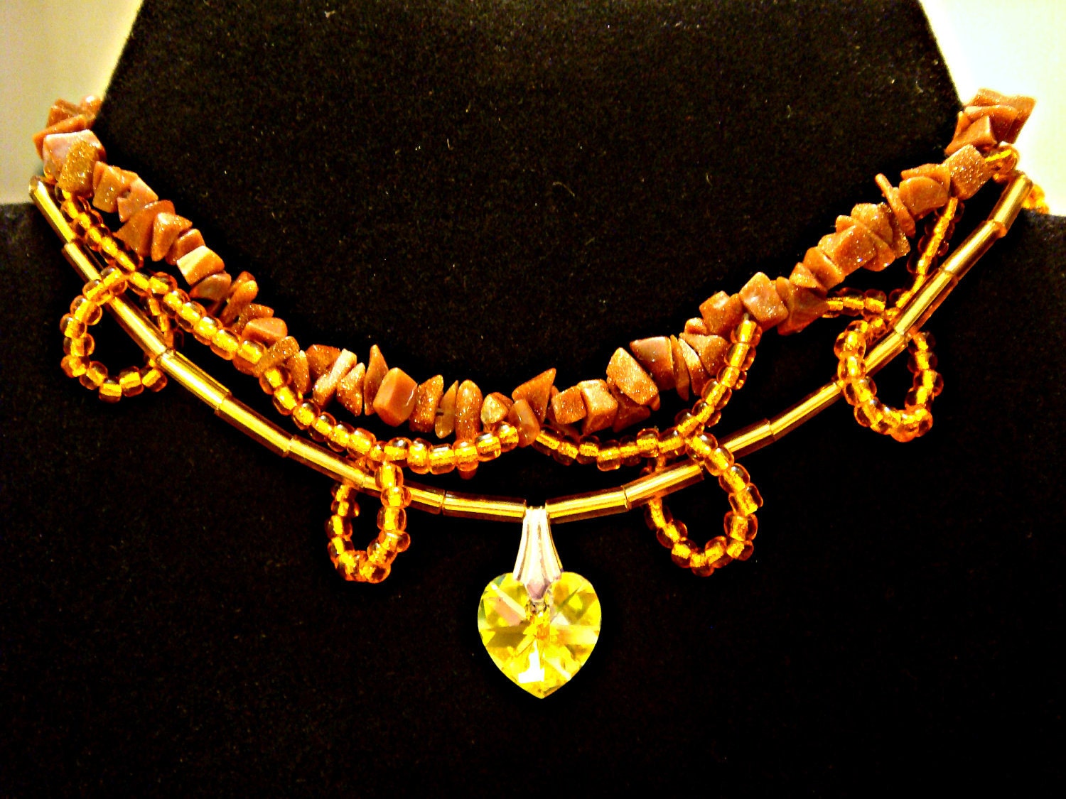 Triple Stranded Golden Bracelet with Swarovski Crystal Heart