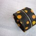 wrist wallet orange polka-dotted