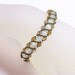 Ice blue bracelet woven with bronze crystals