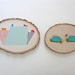 Wood wall art geometric pastel tree slice painting with colorful abstract shapes and stripes: original art