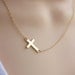 Taylor Gold Sideways Horizontal Cross Necklace - Celebrity jewelry inspired B