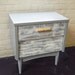 Retro meets Modern Faux Wood Painted Design Side Table with Drawers and Natural Wood Handle Grey and White