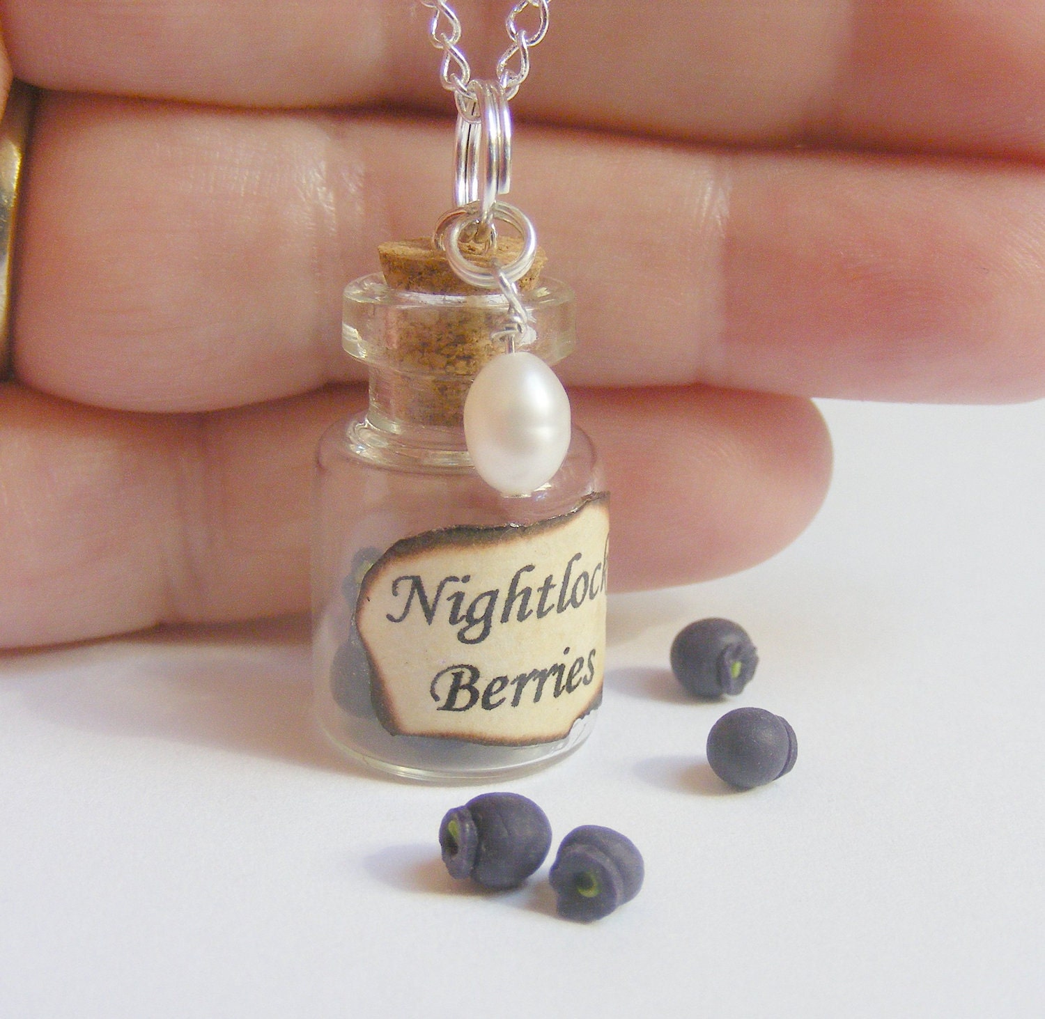 Items similar to Nightlock Berries and Pearl Bottle Necklace Pendant