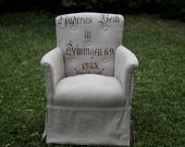 Armchair covered in vintage grain sack.