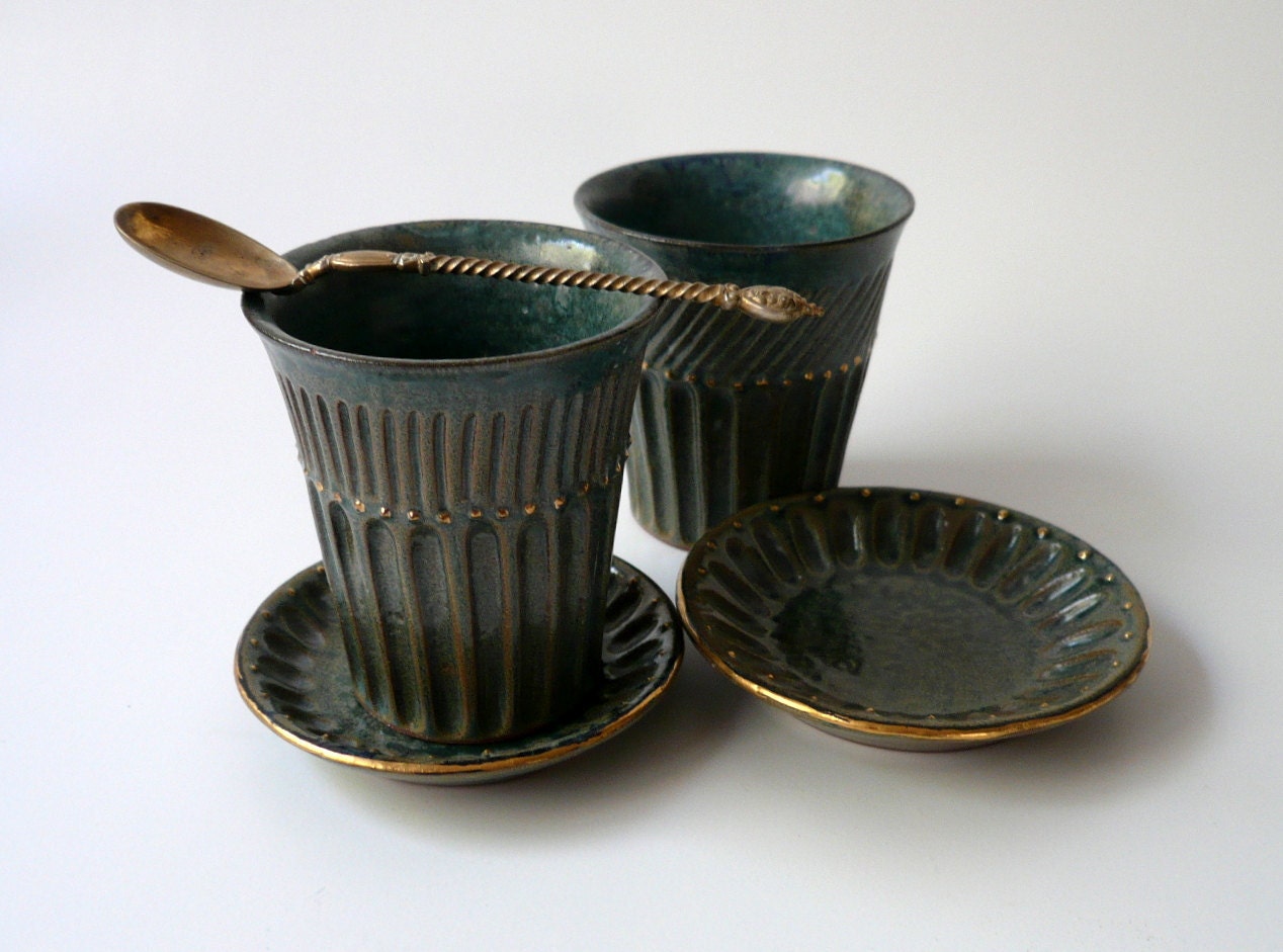 A Cup & Saucer with Sparks of Gold