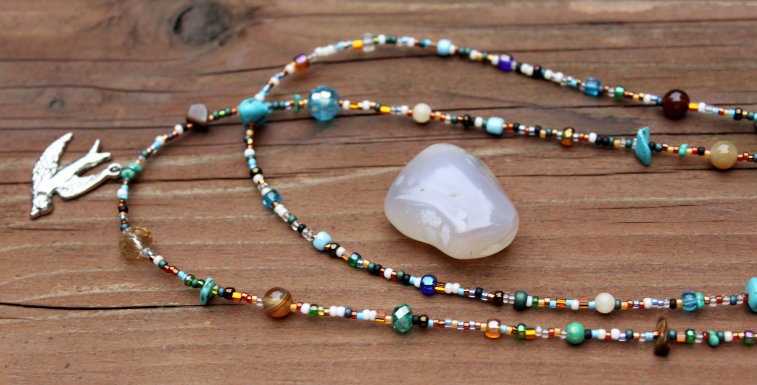 Turquoise and Tigers Eye Double Strand Necklace with Bird Pendant and a Sterling Silver Hoop and Bar Clasp