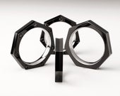 The Heptagon Ring for Women in solid Gold or Platinum with Black DLC Coating