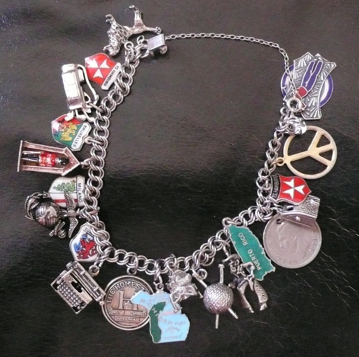 Vintage Silver Charm Bracelet with apollo and variety of charms
