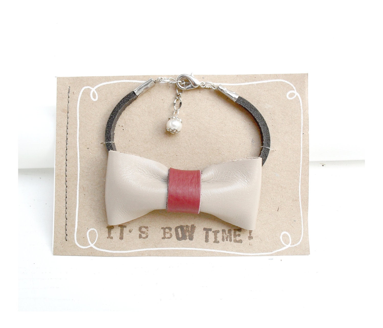 Adjustable bow bracelet - nude leather bow with cherry red detail