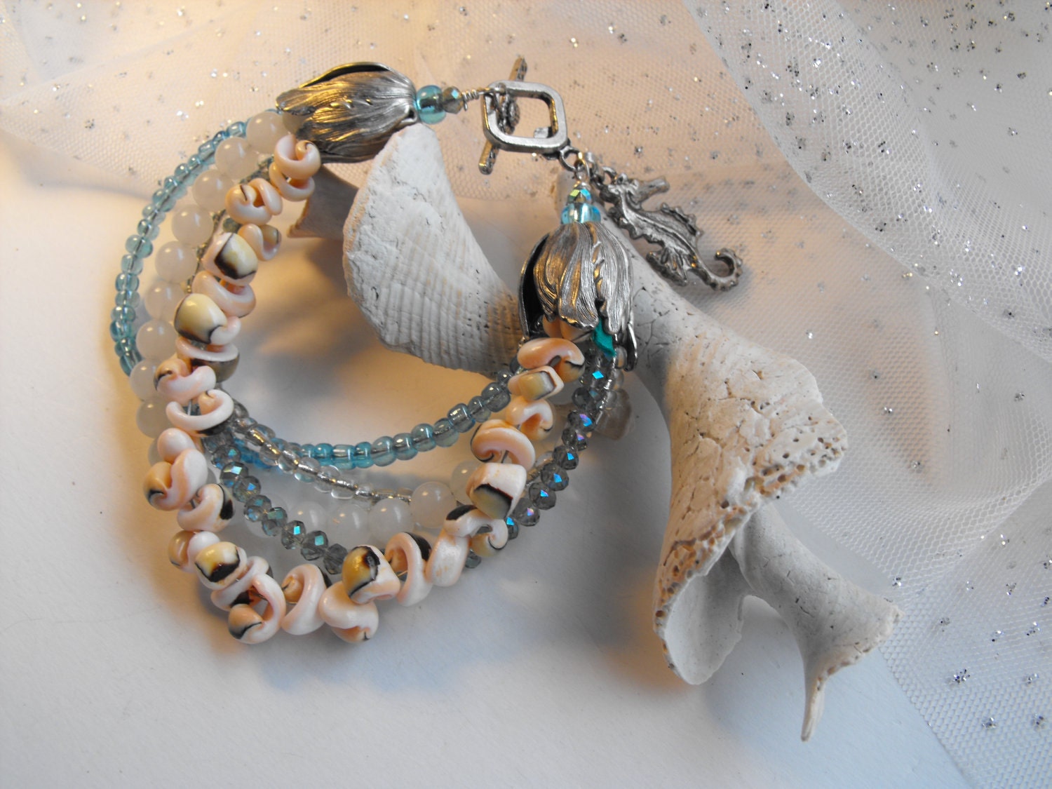 Multistrand BEACHY Bracelet aqua blue, sea shell bracelet - turquoise - freshwater pearls and seahorse charm