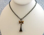 Antique Brass Eiffel Tower Necklace, Great Eiffel Tower Charm Dangles From A Bow Charm