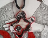 Quirky black and white puddle pendant
