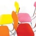 SOLD - 4 dining chairs - pink / orange / yellow / red - steel base